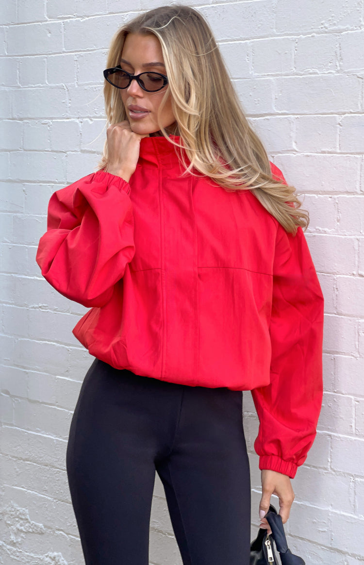 Beginning Boutique Enya Red Funnel Neck Sports Jacket red cropped funnel neck jacket with long voluminous sleeves and elastic