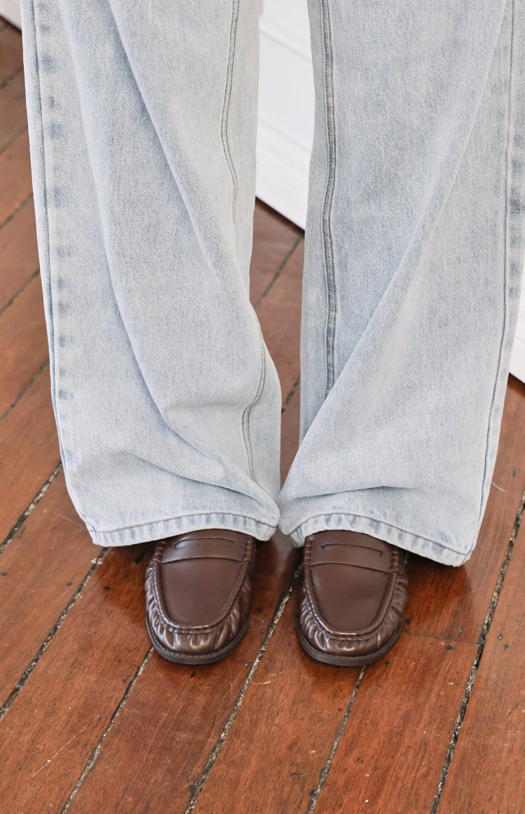Beginning Boutique Etta Brown Slip On Loafers brown slip on loafers with a penny strap and moc toe stitching