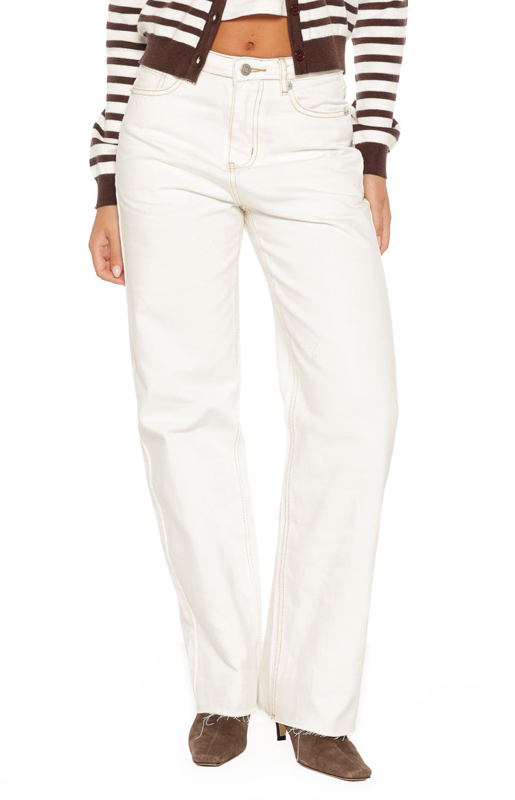 Front view of high-waisted white denim jeans with a wide-leg fit and visible contrast stitching