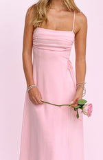 Pink sleeveless maxi dress with a ruched straight neckline and adjustable side tie detail