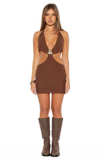 Front view of a brown ribbed knit mini dress with a halter V-neck and waist cutouts featuring a gold chain