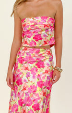 Close-up of the yellow floral pop print strapless bandeau crop top