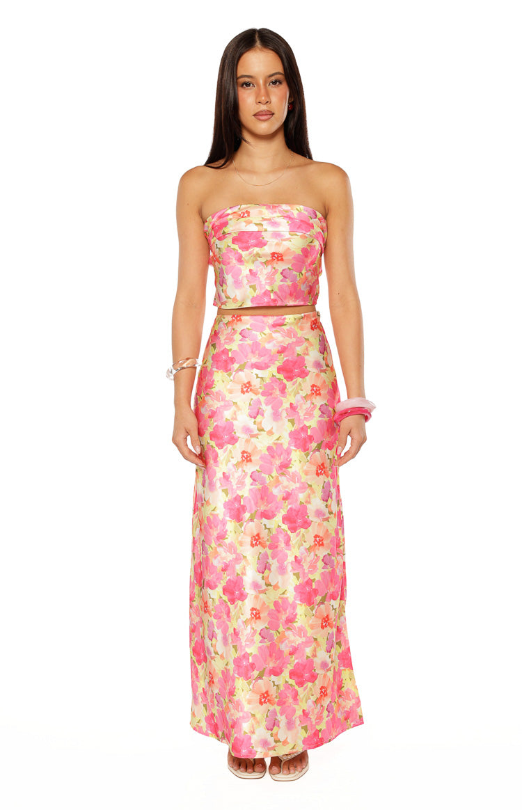 Close-up of the yellow floral pop print strapless top, showing the fitted bodice and cropped length