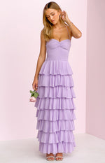 Front view of a lilac maxi dress with a ruched sweetheart neckline and tiered ruffle skirt