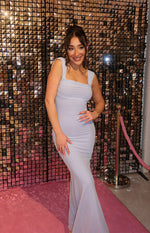 Lilac mesh maxi dress with a ruched square neckline, wide straps, and a fitted bodycon silhouette