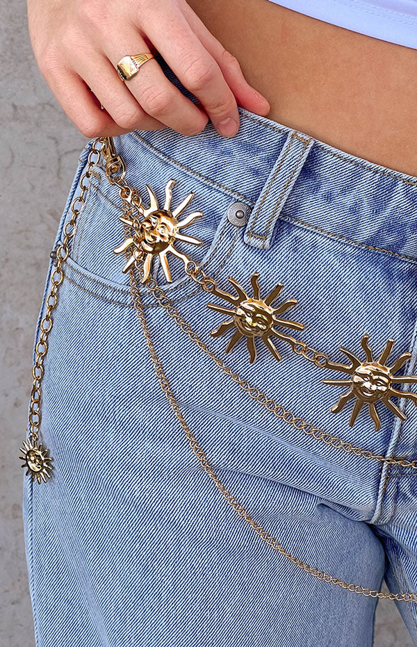 Beginning Boutique Gold Multi Chain Star Belt gold multi-chain belt with sun-shaped charms