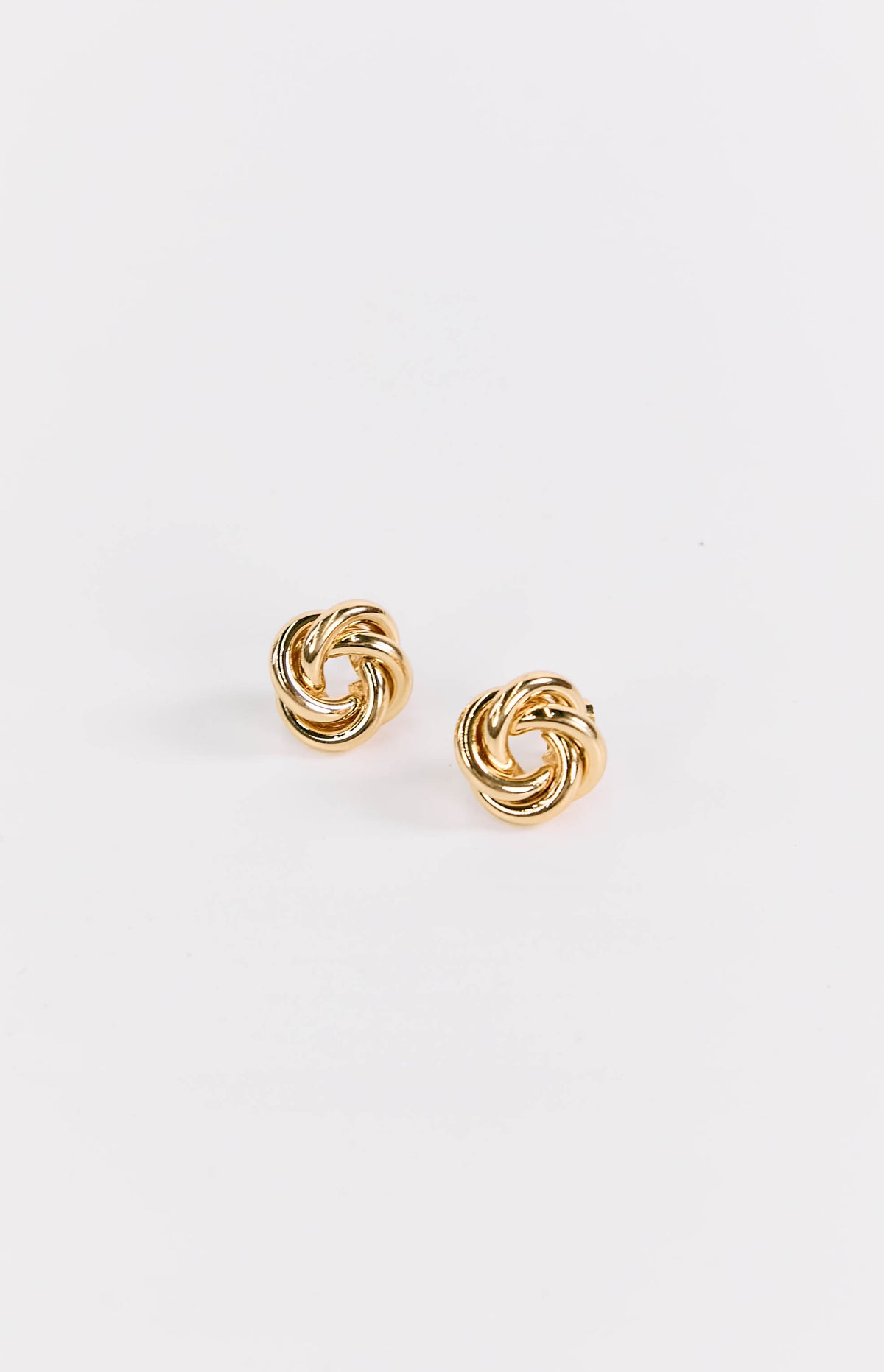Pair of gold stud earrings with a polished finish and intricate twisted knot design