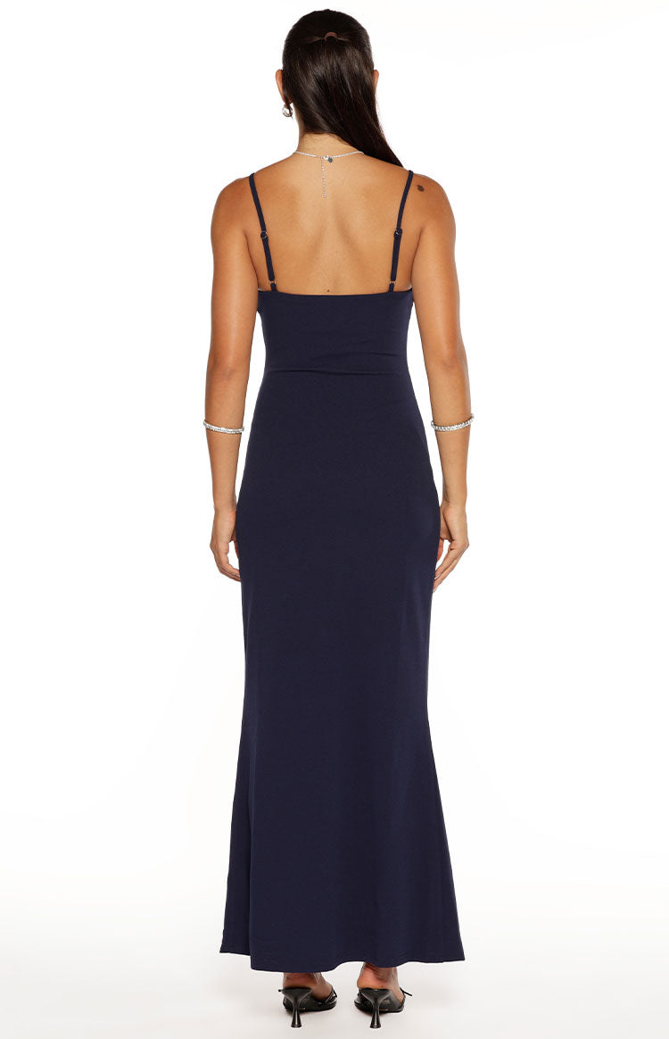 Rear view of a navy crepe maxi dress showing the adjustable spaghetti straps and low scoop back