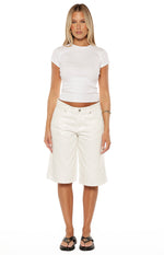 Front view of white relaxed wide-leg denim shorts with a raw hem and front pockets