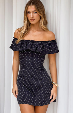 Beginning Boutique Haylie Black Polka Dot Off Shoulder Mini Dress black polka dot off shoulder mini dress with a ruffled neck