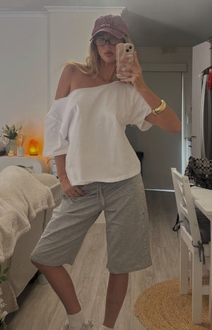 Beginning Boutique Henrie White Off Shoulder Boxy Tee white off-shoulder wide neck boxy tee with elbow-length sleeves