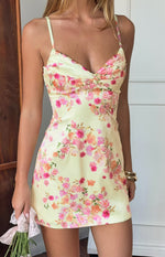 Close-up of the honey yellow floral mini dress showing the ruched sweetheart neckline and thin straps