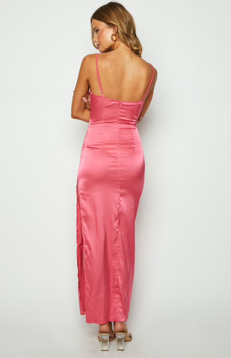 Rear view of a honey pink satin maxi dress with thin spaghetti straps, an invisible back zipper, and a high side slit