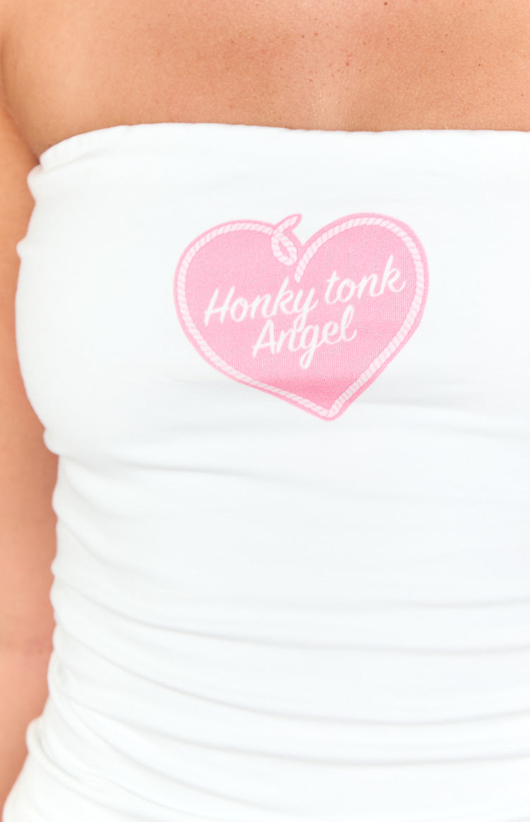 Close-up of the pink heart graphic with 'Honky tonk Angel' text on a white ruched tube top