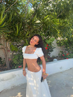 White broderie trim crop top with a square neckline and short puff sleeves