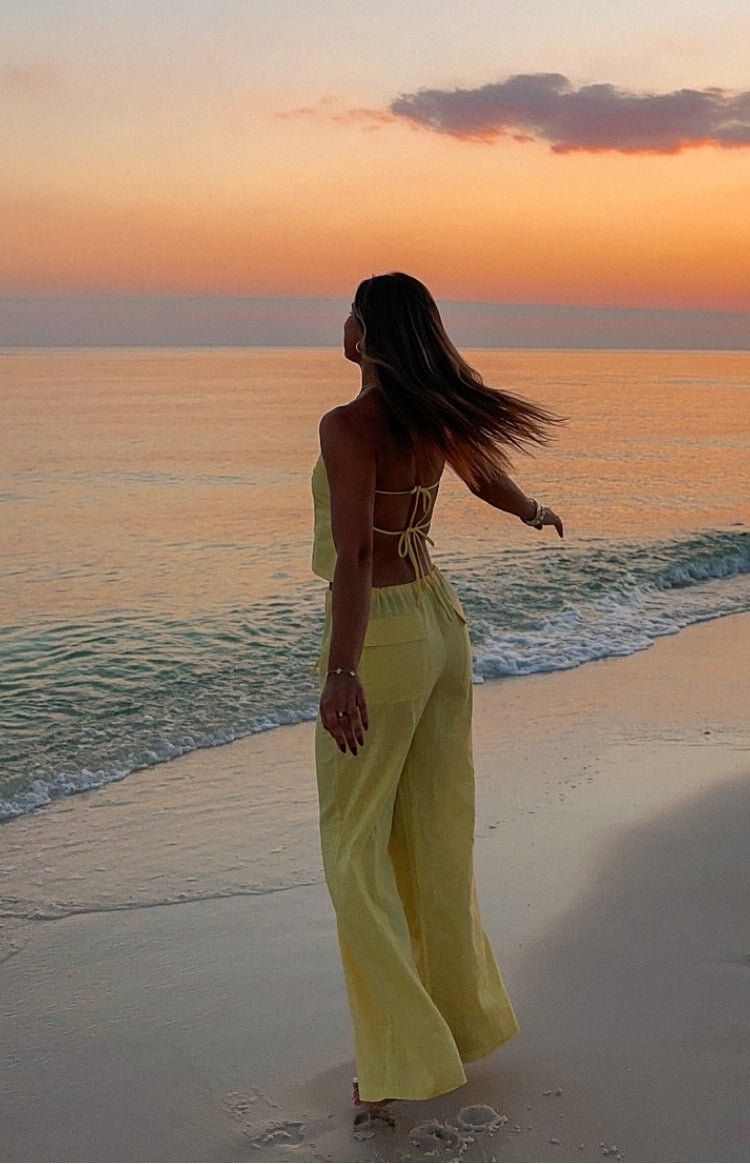 Beginning Boutique Vienna Yellow Pants yellow high-waisted wide-leg flowy pants with an elasticated waist