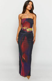 Front view of a black mesh strapless maxi dress with a vibrant blurred tulip print in red purple and yellow, featuring a ruched waist
