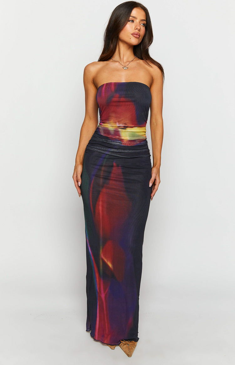 Front view of a black mesh strapless maxi dress with a vibrant blurred tulip print in red purple and yellow, featuring a ruched waist