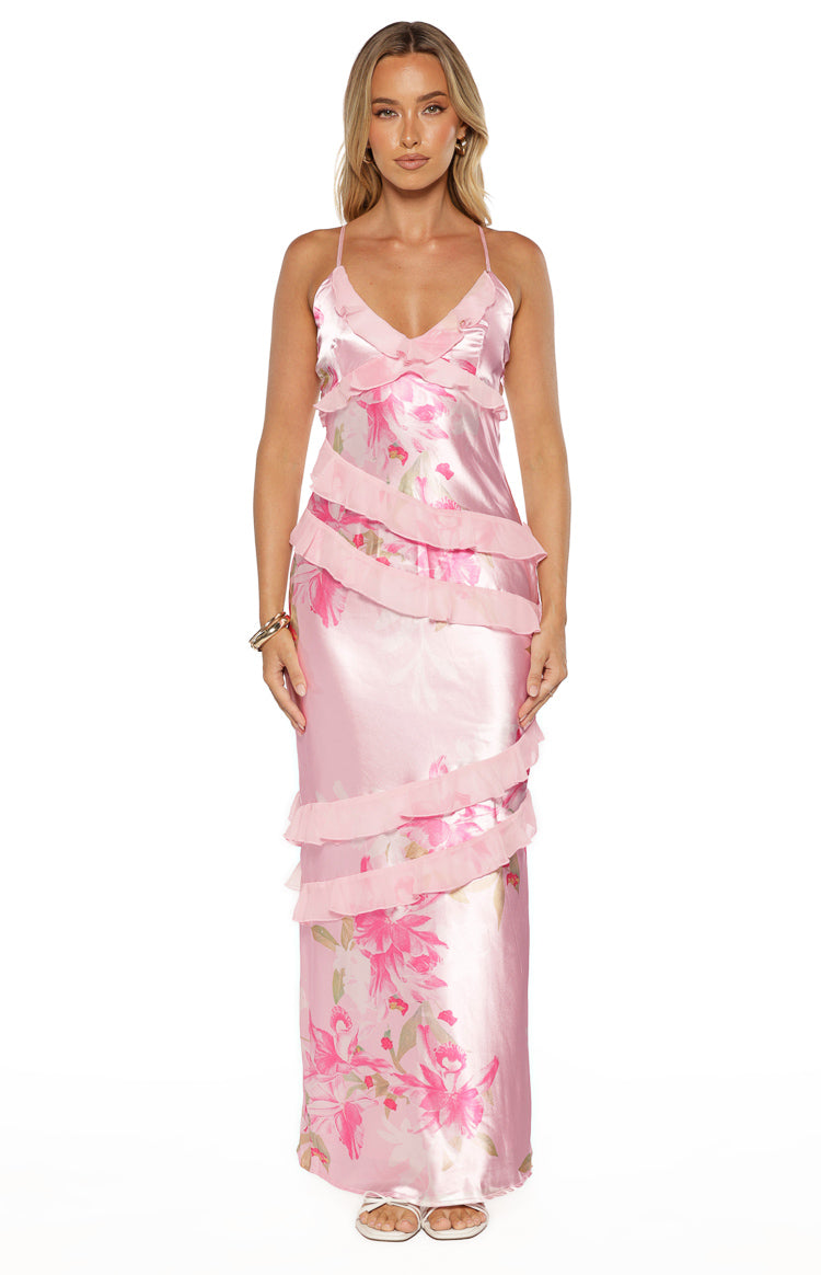 Front view of a pink floral print satin maxi dress with tiered sheer ruffles and V-neckline