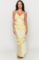 Beginning Boutique Inara Yellow Ruffle Maxi Dress yellow satin V-neck maxi dress with ruffled neckline, spaghetti straps, and cascading ruffles