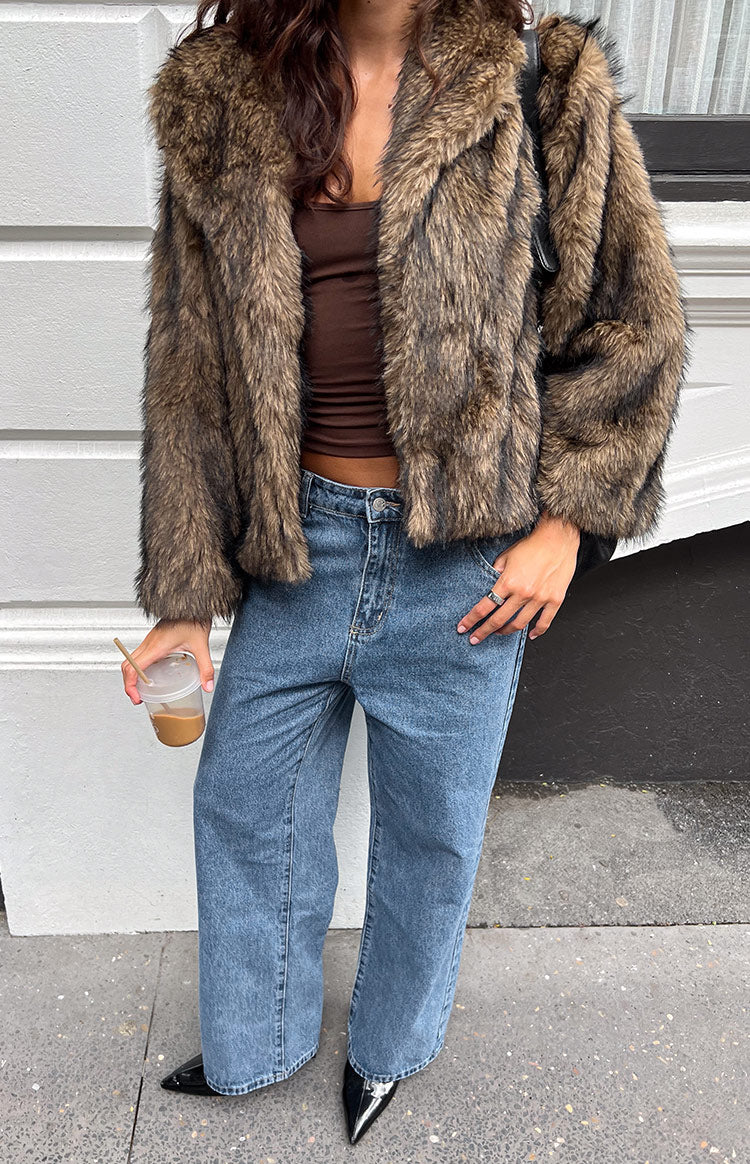 Open front view of a chocolate faux fur jacket with wide lapels and a textured finish