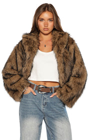 Cropped chocolate faux fur jacket with a distinct striped pattern, wide lapels, and full sleeves