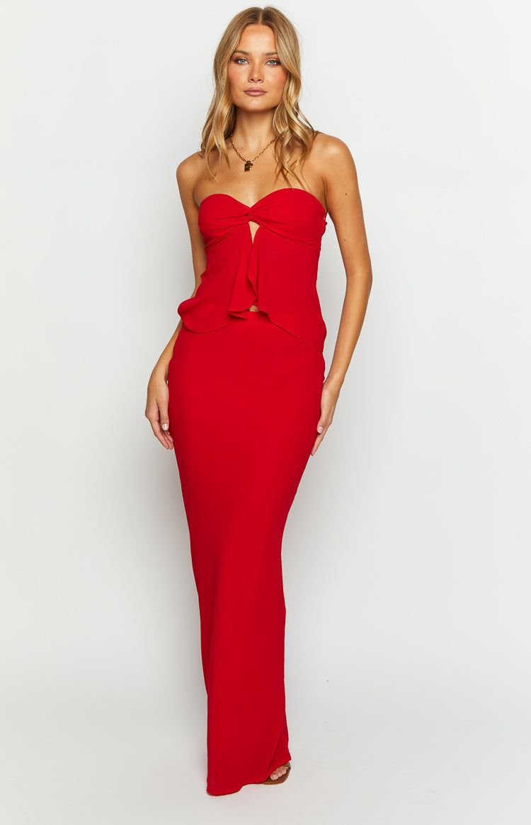 Front view of a red fitted maxi skirt with a straight, floor-length cut