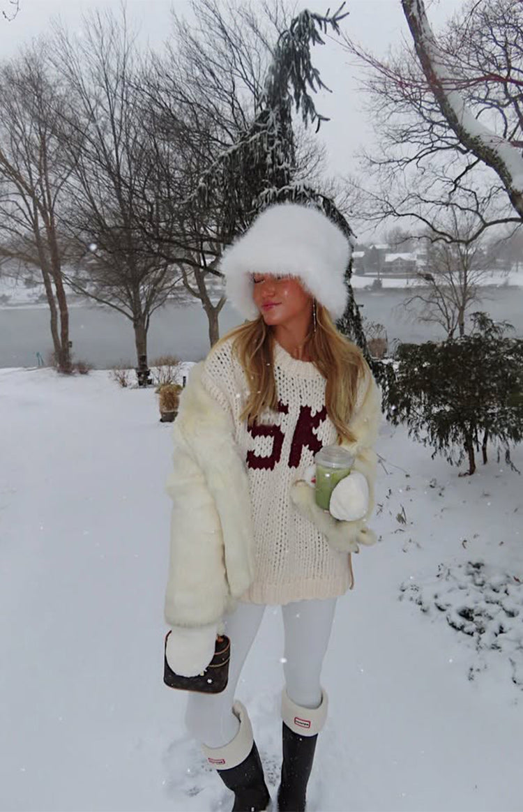 Cream chunky knit sweater with burgundy 'SKI' jacquard lettering and a relaxed fit