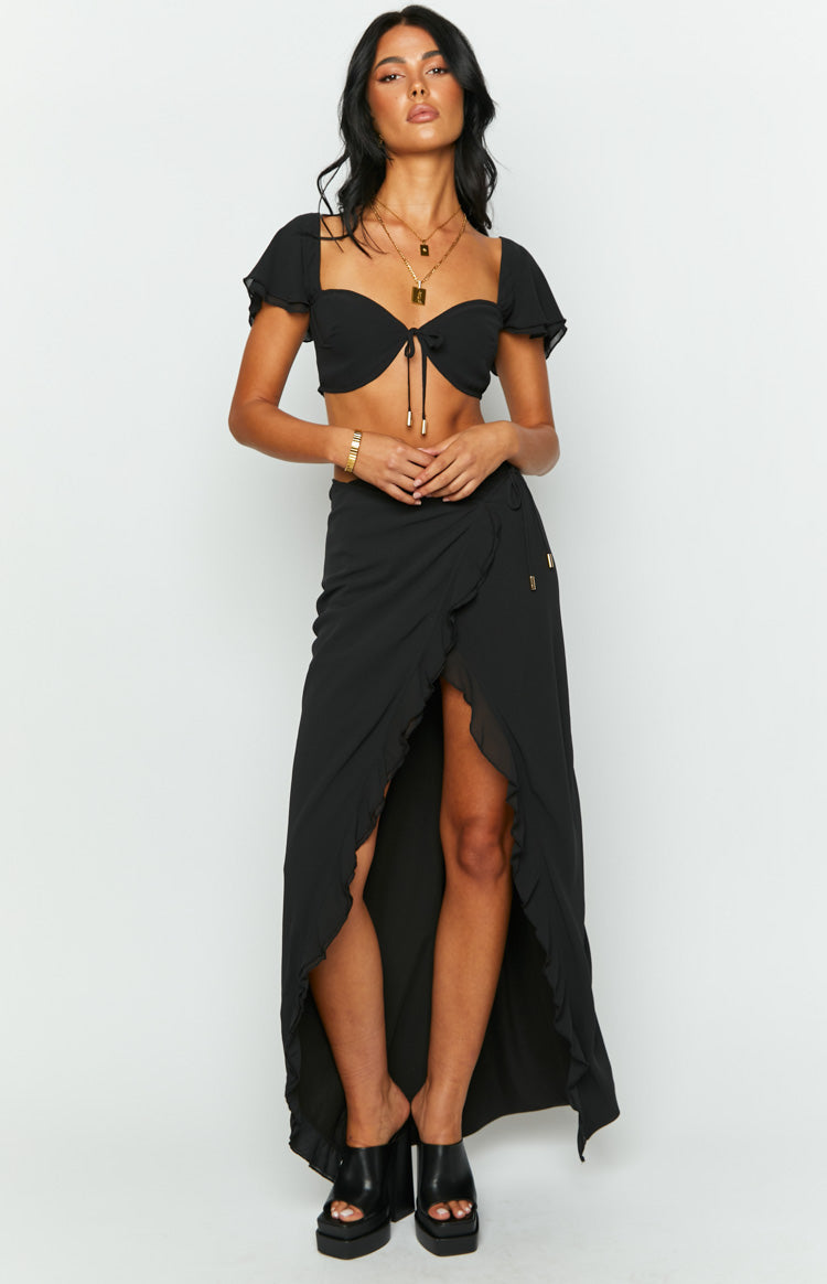 Black sweetheart neckline crop top with short ruffled sleeves and a tie-front detail with gold toggles
