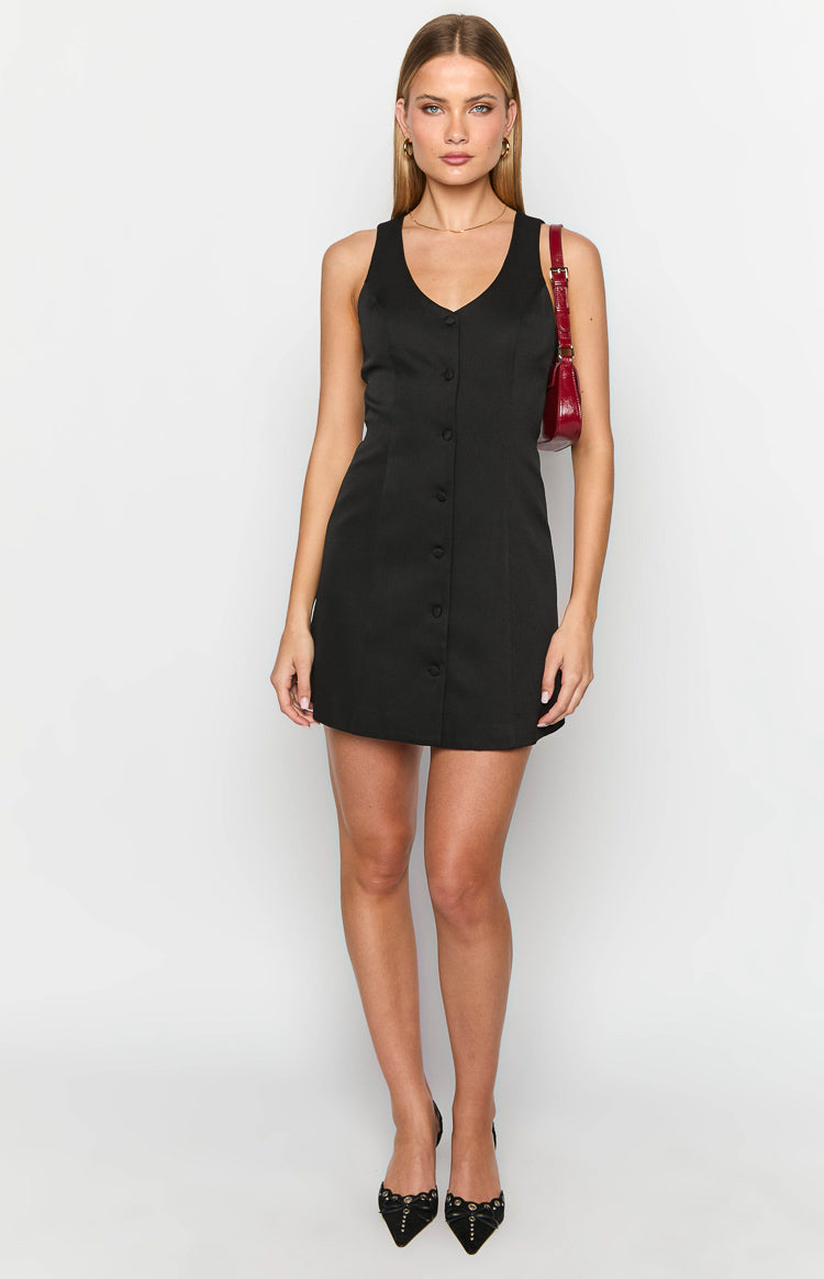 Front view of a black V-neck sleeveless mini dress with a full button-front detail