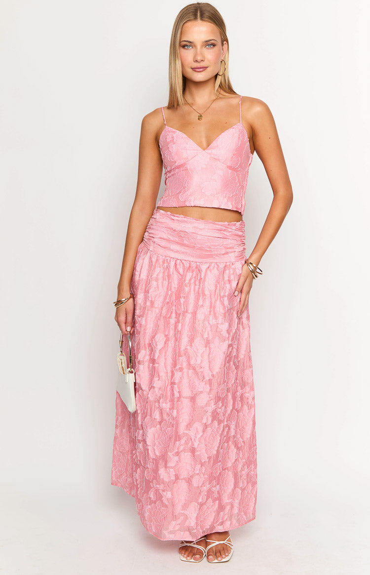 Pink floral jacquard crop top with a sweetheart neckline, thin straps, and a fitted cropped hem