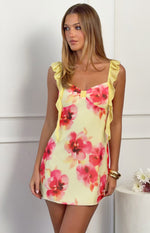 Front view of a yellow and pink floral chiffon mini dress with ruffled straps and a sweetheart neckline