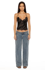 Black satin cami top with a V-neckline, delicate lace trim on the neckline and hem, and thin straps