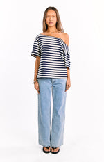 Front view of a navy and white striped oversized off-shoulder top with short sleeves