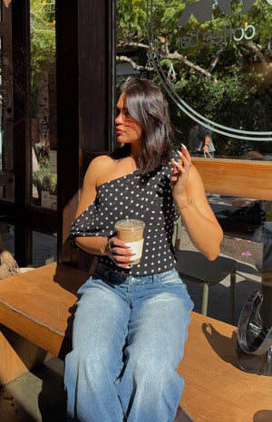 Beginning Boutique Khamie Black Polka Dot Off Shoulder Top black and white polka dot one-shoulder top with a puff sleeve