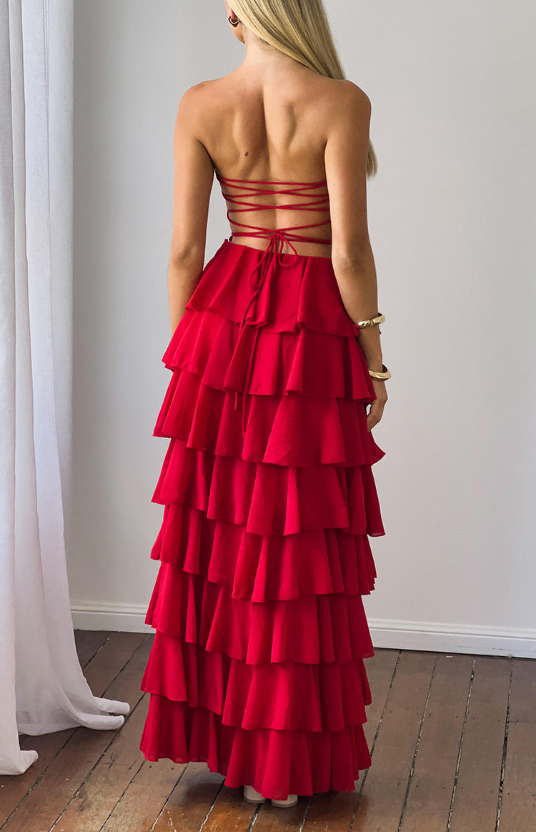 Rear view of a red strapless maxi dress with a criss-cross lace-up back and full tiered ruffle skirt