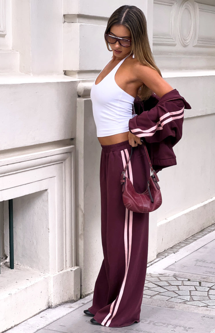 Beginning Boutique Kosie Burgundy and Pink Stripe Track Pants burgundy wide-leg track pants with double pink side stripes