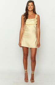 Front view of a yellow satin mini dress with a draped cowl neckline and thick straps