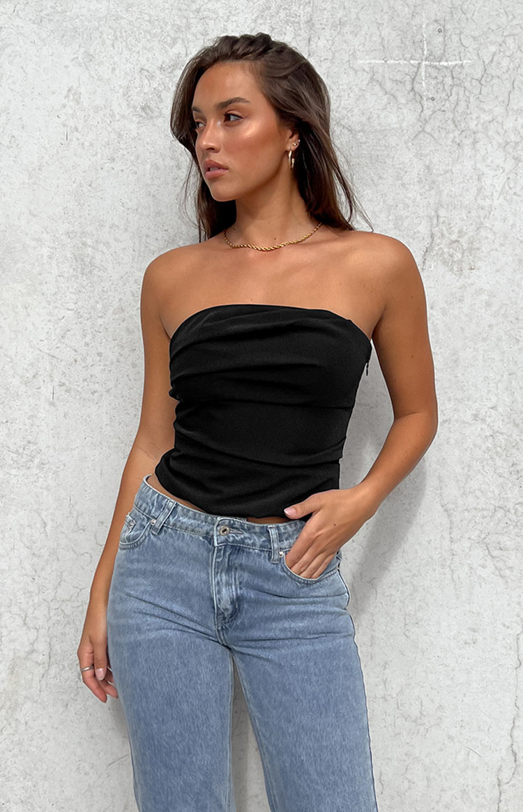Black strapless top with a ruched front and a visible side zipper closure