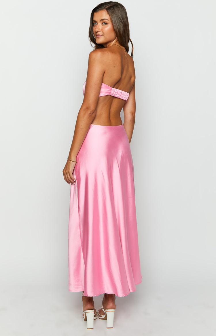 Rear-side view of a pink satin strapless maxi dress showing the ruched elastic back band and open back detail