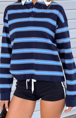Black athletic shorts with a white drawstring and white vertical side stripes
