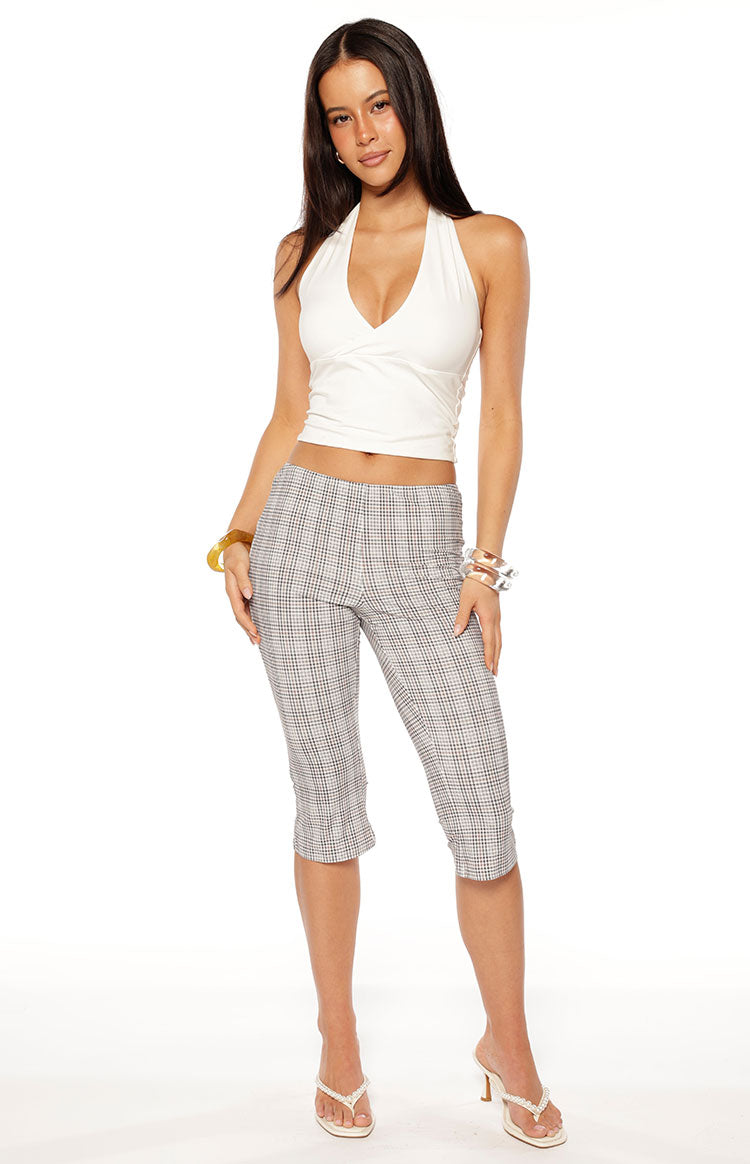 Grey and white plaid capri pants with a fitted silhouette and mid-calf length