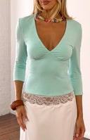 Beginning Boutique Livvy Turquoise 3/4 Sleeve V Neck Jersey Top turquoise jersey V-neck top with 3/4 sleeves and gathered bus