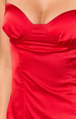 Close-up of the red satin bodice with a sweetheart neckline, structured cups, and subtle side ruching