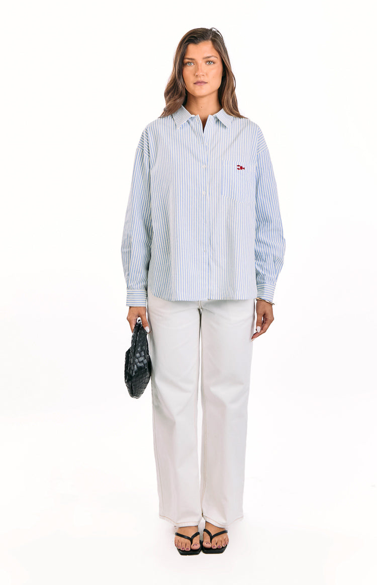 Blue and white stripe button up shirt with a red embroidered lobster on the left chest pocket