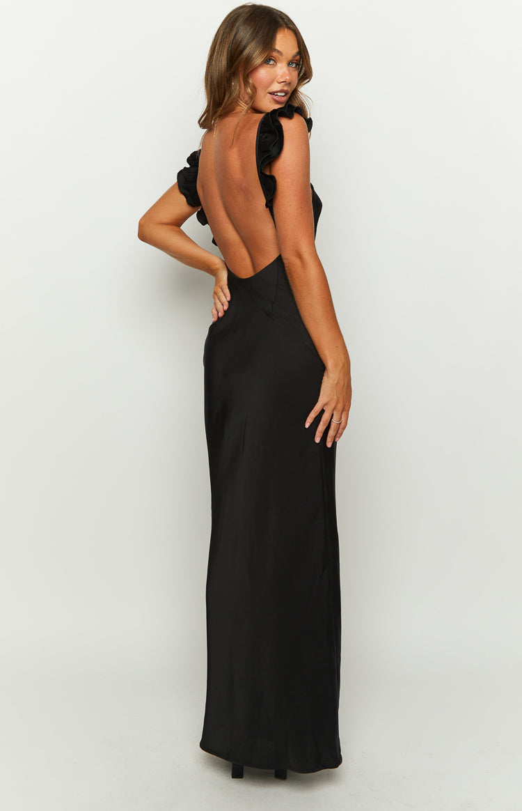 Rear view of a black formal dress with a low scoop back and ruffled shoulder straps