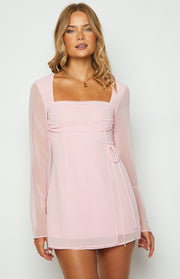 Baby pink mini dress with square neckline, ruched bust, and sheer long sleeves