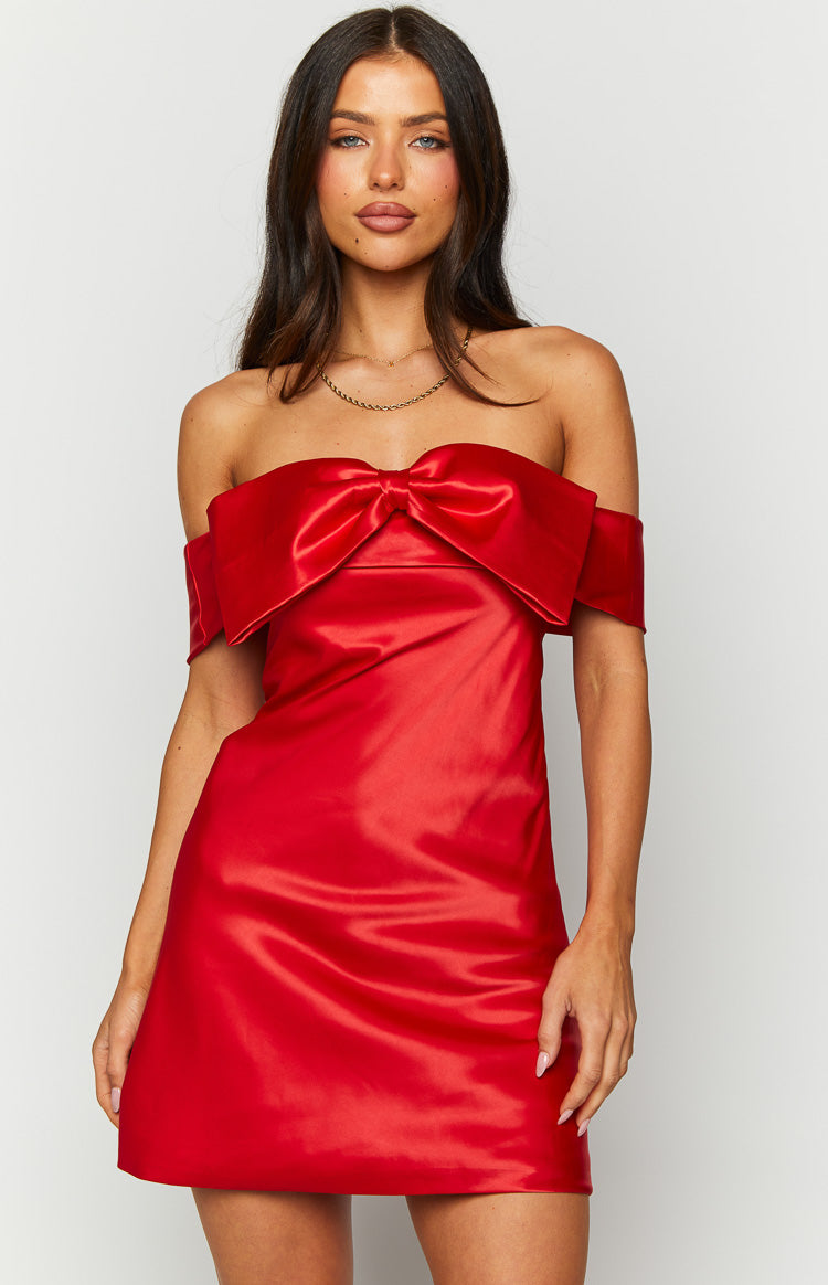 Red satin off-shoulder mini dress with a prominent bow detail at the bust