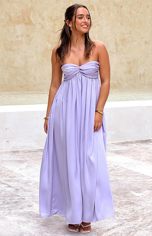 purple strapless satin maxi dress with bust detail styled on brunette model with gold jewellery