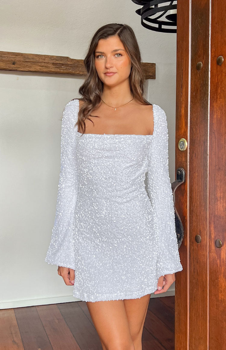 Beginning Boutique Marienne White Velvet Sequin Long Sleeve Mini Dress white sequin mini dress with square neckline long bell sleeves and ruched bodice